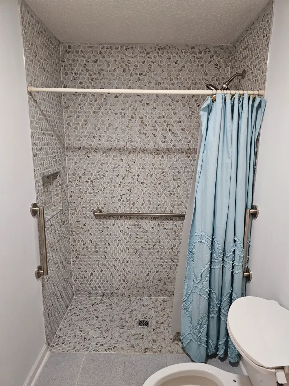 Modern Bathroom with Blue Curtain